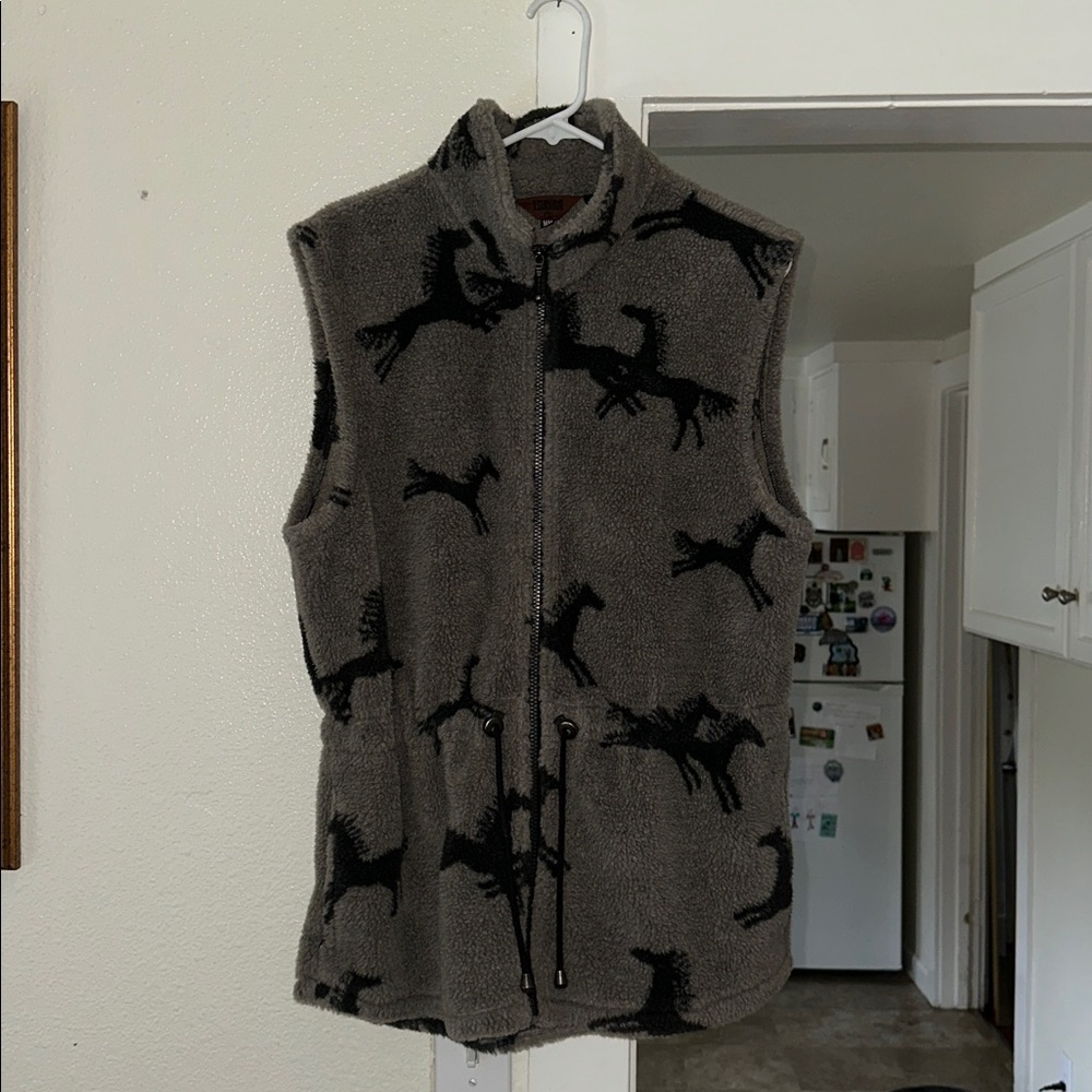 Vintage Tsunami sweater vest size Medium. Excellent condition.
